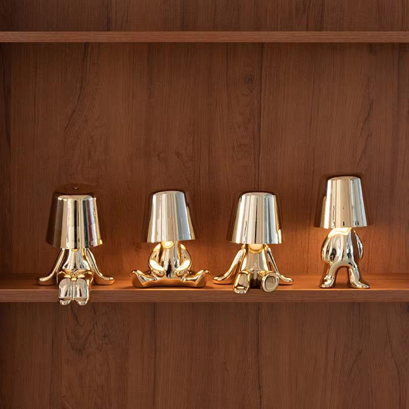 Hdc Little Golden/Silver Man Sitting With One Leg Stretched Stylish Nordic Golden Luxury Portable LED Desk Lamp Cafe Bar Restaurant Home Decoration Night Light