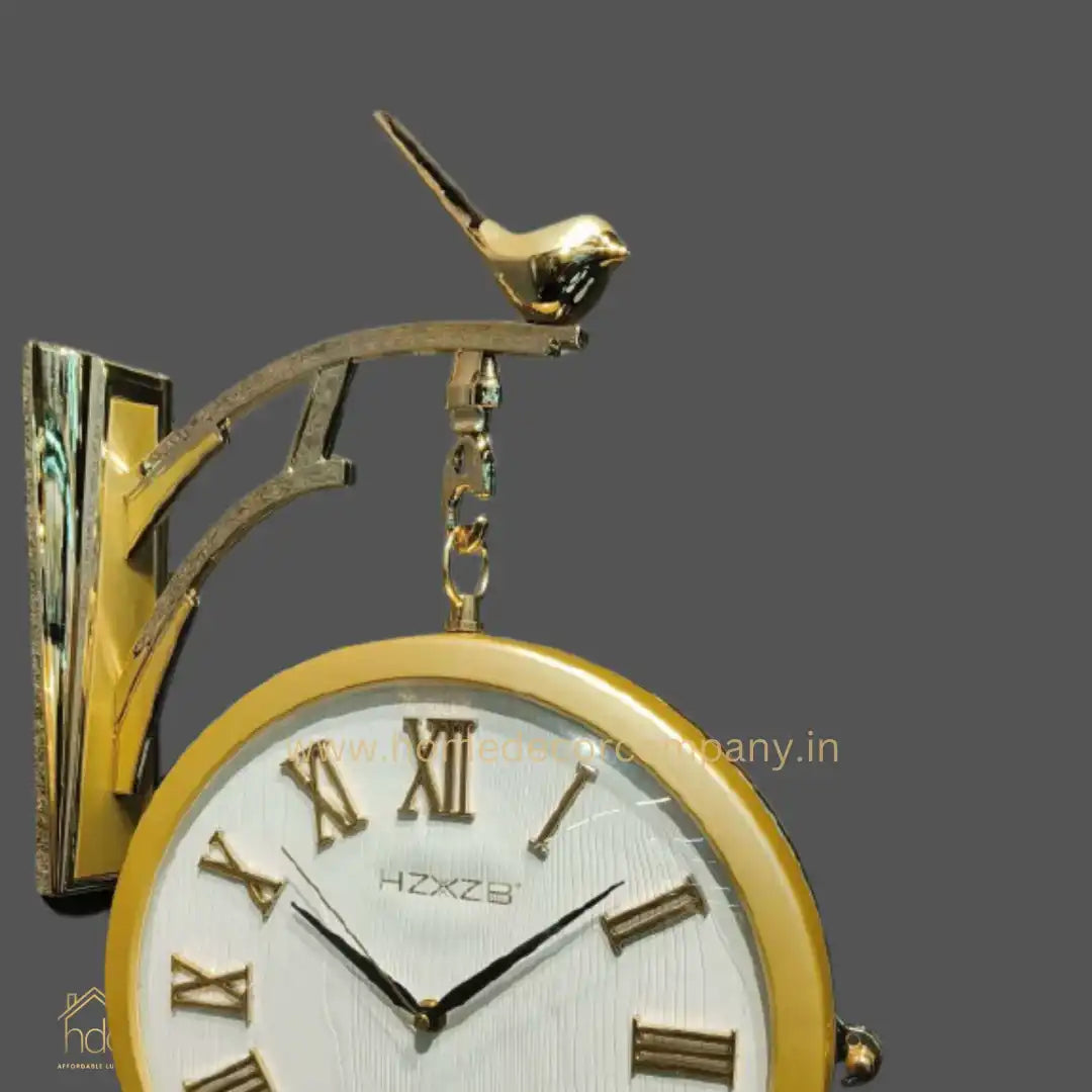 HDC Modern Double-Sided Vintage-Style Station Clock With a Decorative Clock has a Gold Frame, a White Face with Roman Numerals Hanging Clock with a Bird Perched on Top