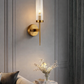 Ojaro 1 Light Antique Brass Clear Glass Long Wall Light- Warm White