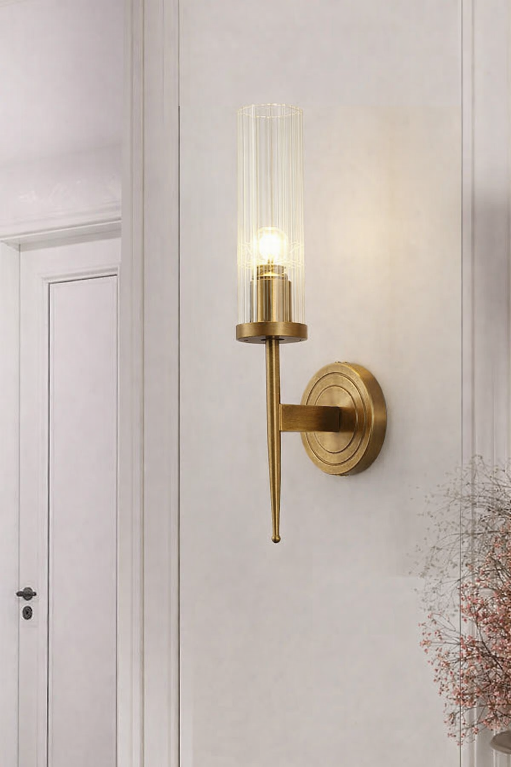 Ojaro 1 Light Antique Brass Clear Glass Long Wall Light- Warm White