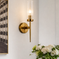 Ojaro 1 Light Antique Brass Clear Glass Long Wall Light- Warm White