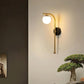 HDC Minimalist Globe Wall Lamp with Curved Metal Arm Modern Gold Wall Light