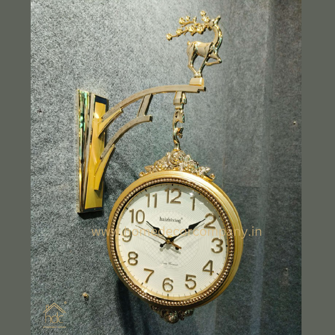 HDC Modern Double-Sided Wall Clock With a Decorative Golden Frame and a Deer Figurine on Top