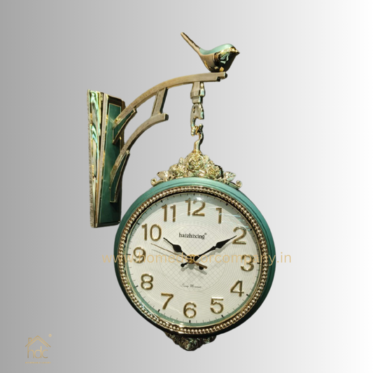 HDC Modern Double-Sided Wall Clock With a Vintage Design predominantly Green and Gold, a Bird-Shaped Ornament on Top