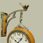 HDC Modern Double-Sided Wall Clock With a Retro Design Wooden clock face with black hands and gold-colored numerals, encased in a Wooden frame with gold detailing a Bird-Shaped Ornament on Top